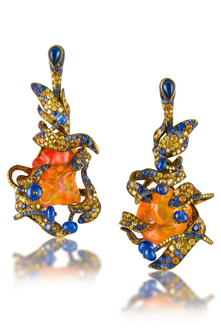 Professional jewelry photography of earrings with fire opal by Arjuna Irsutti