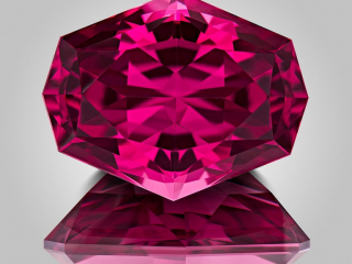 Professional gem photography of a purple garnet by Arjuna Irsutti