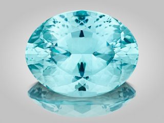 Professional gem photography of a Para&iacute;ba tourmaline by Arjuna Irsutti