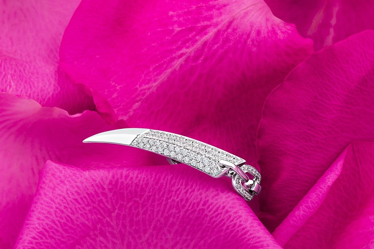 Professional jewelry photography of a ring sword with diamonds by Arjuna Irsutti