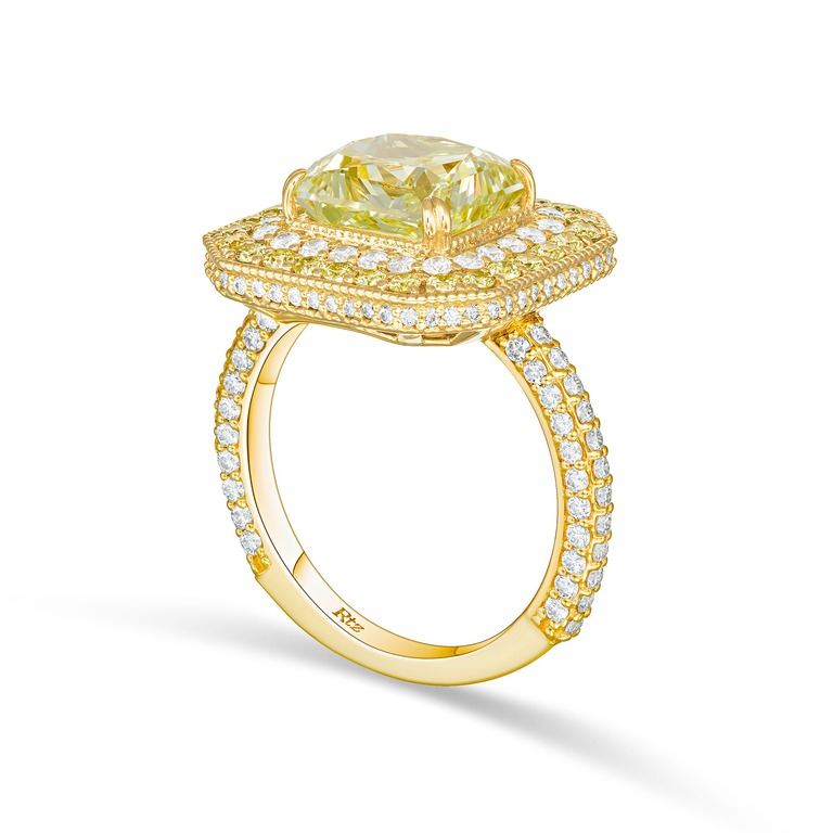 Professional photography of a ring with yellow diamond by Arjuna Irsutti