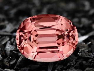 Professional gem photography of an orange tourmaline by Arjuna Irsutti