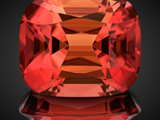 Professional gem photography of an orange tourmaline by Arjuna Irsutti