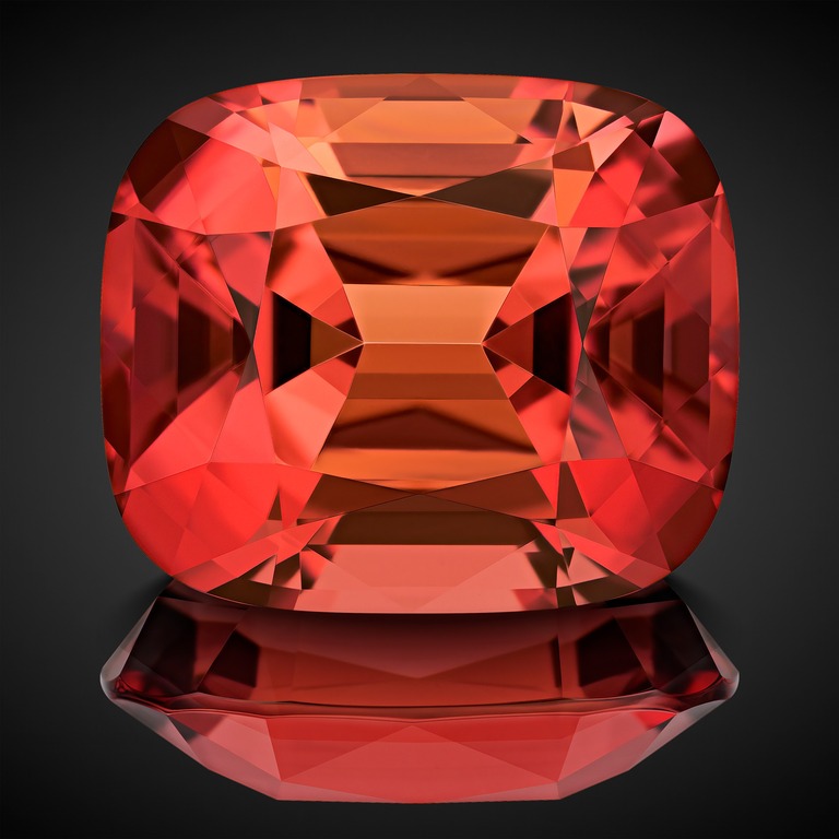 Professional gem photography of an orange tourmaline by Arjuna Irsutti