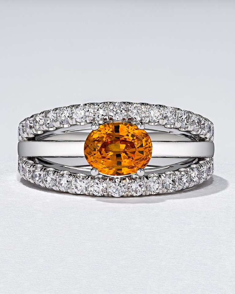 Professional jewelry photography of a ring with orange sapphire by Arjuna Irsutti